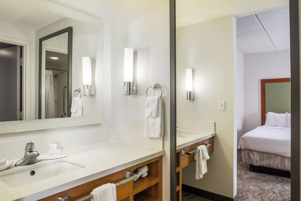 combined shower/bathtub, free toiletries, hair dryer, towels