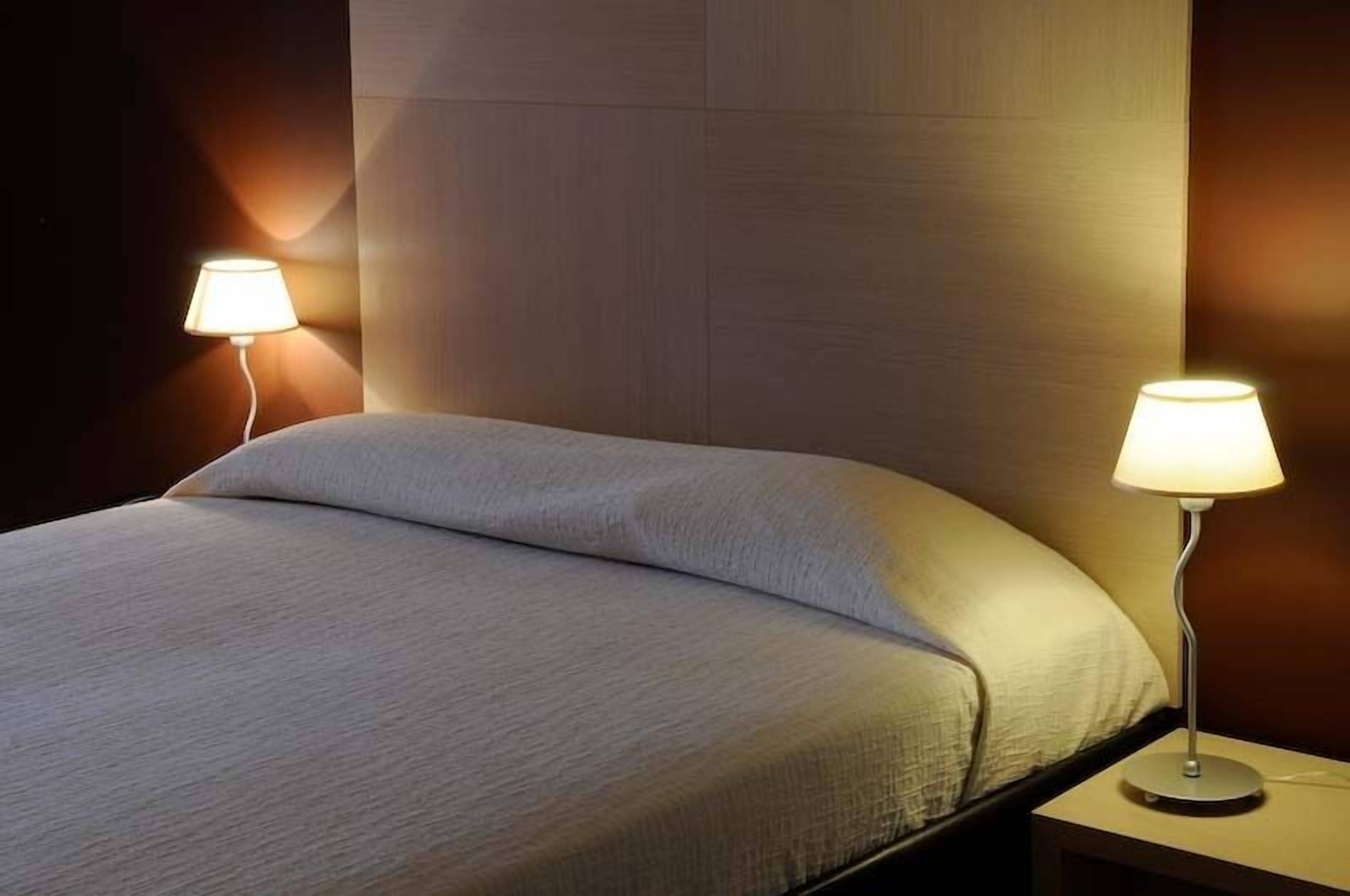 Premium bedding, desk, soundproofing, iron/ironing board