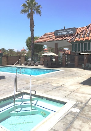 Outdoor pool, open 7:00 AM to 11:00 PM, pool umbrellas, pool loungers