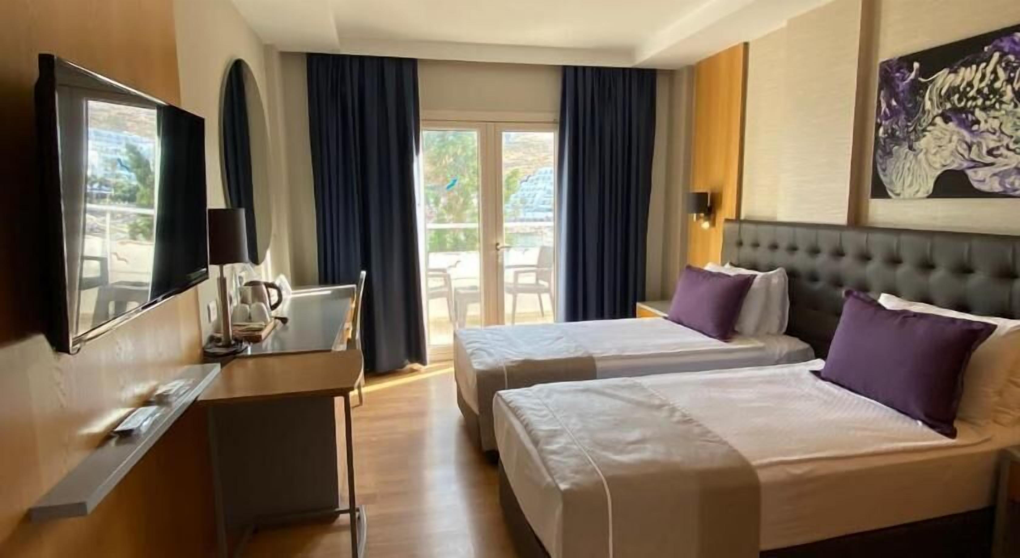 Minibar, in-room safe, blackout curtains, iron/ironing board