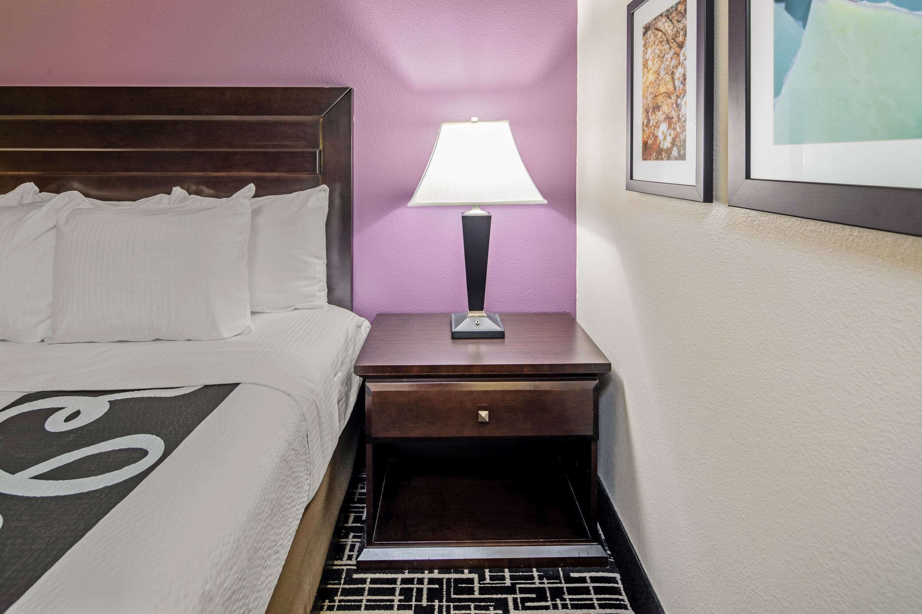 premium bedding, pillow-top beds, desk, laptop workspace