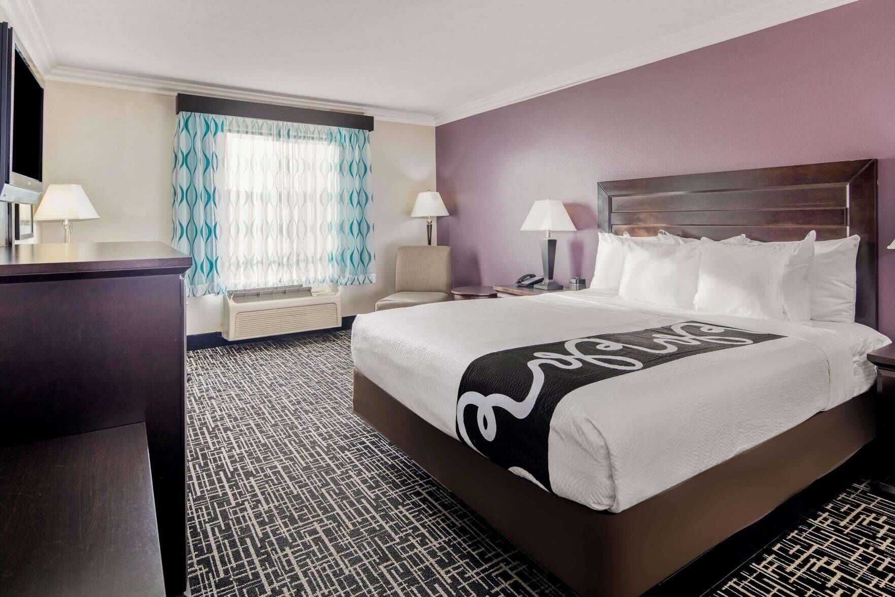 Premium bedding, pillowtop beds, desk, laptop workspace