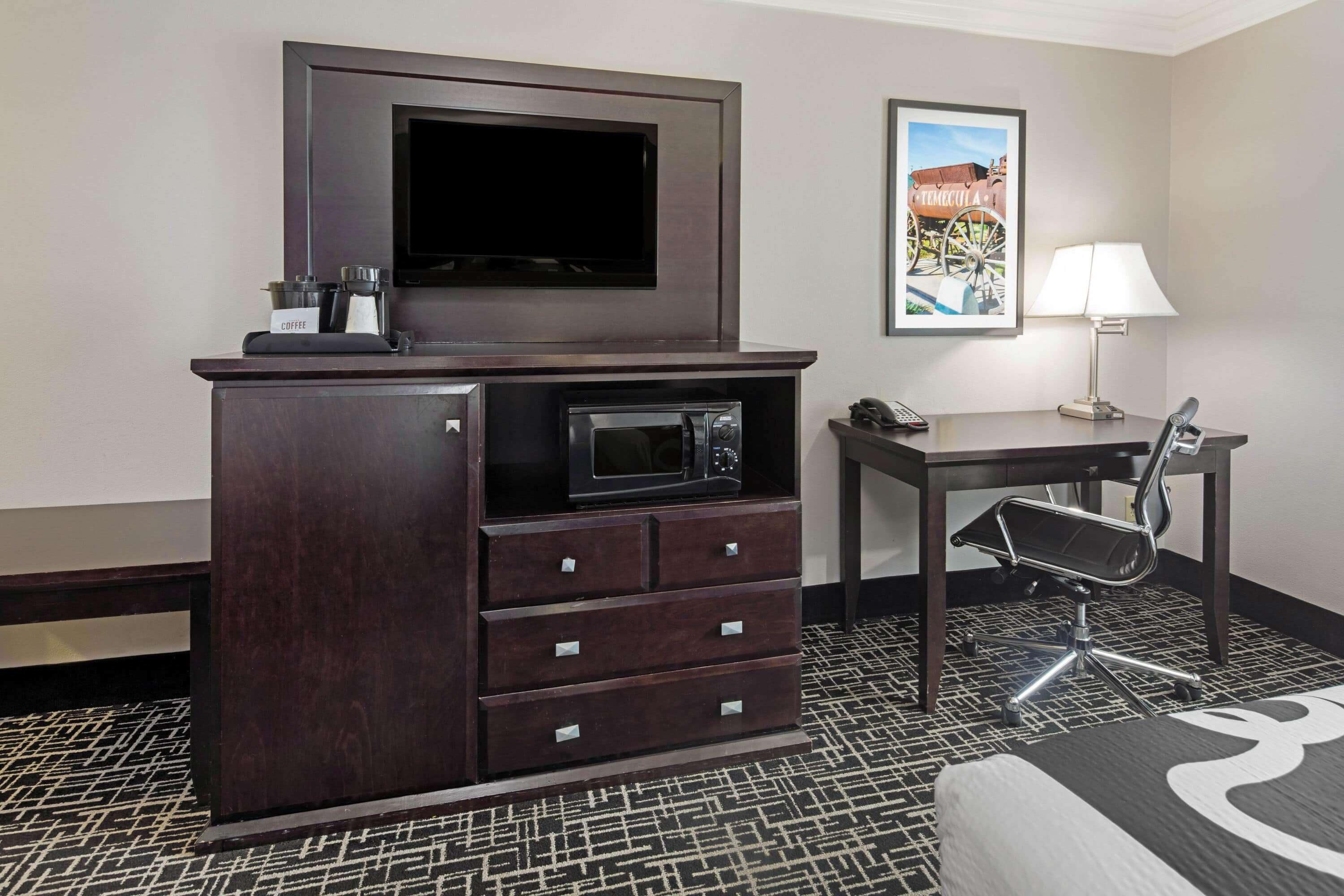 premium bedding, pillow-top beds, desk, laptop workspace