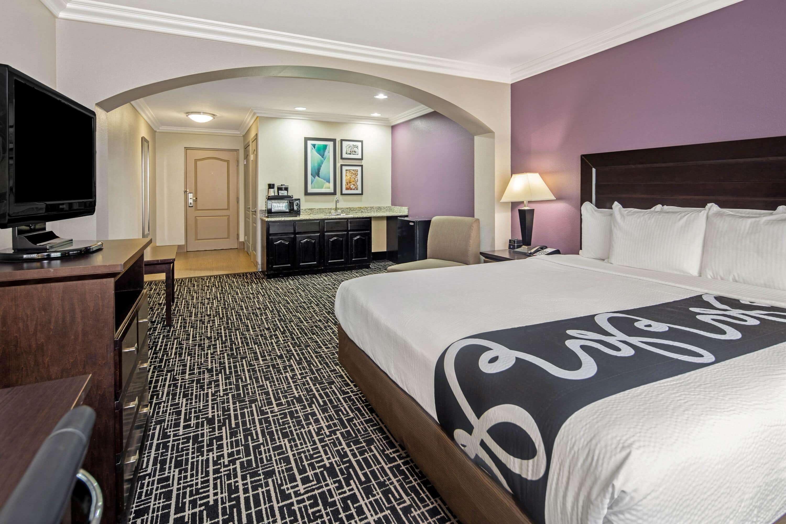 premium bedding, pillow-top beds, desk, laptop workspace