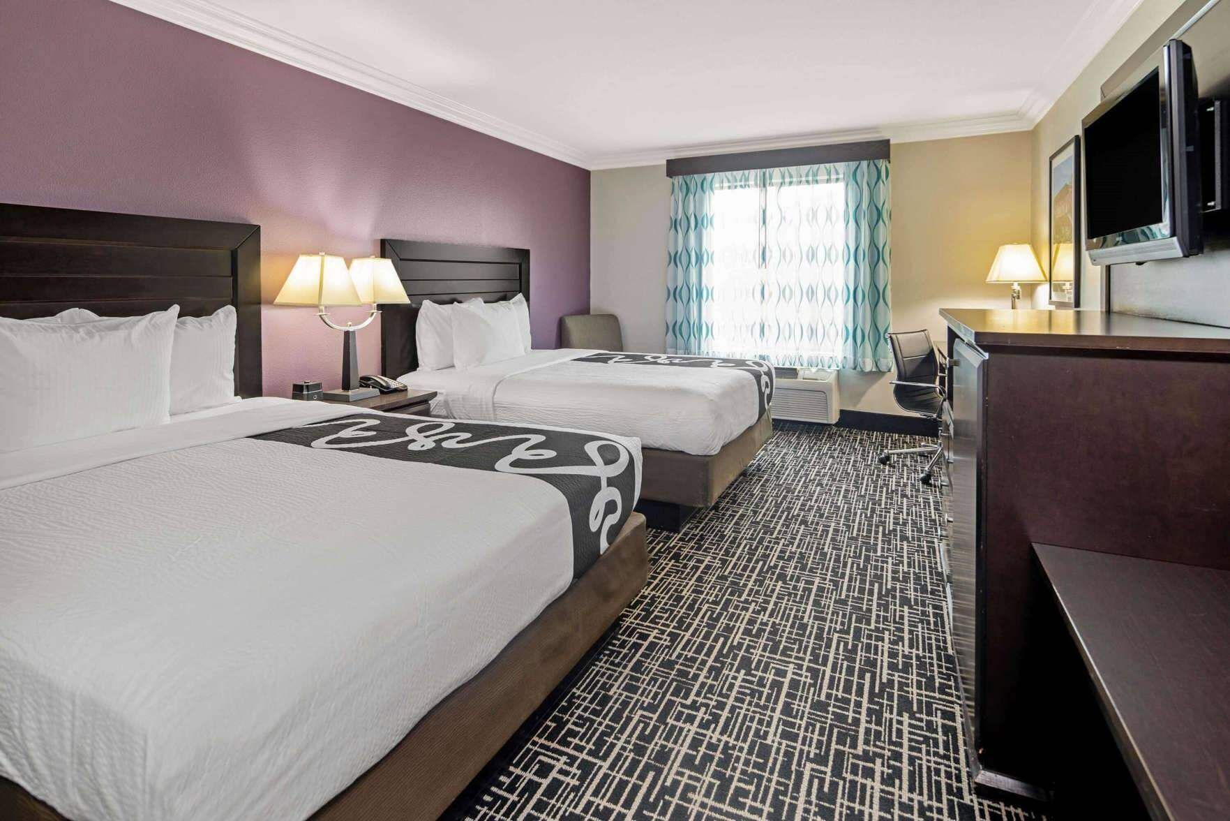 Premium bedding, pillowtop beds, desk, laptop workspace
