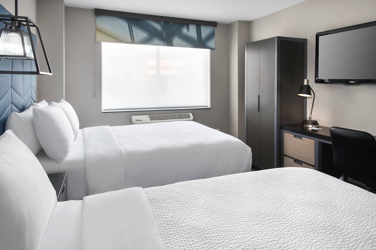 Literie hypoallergénique, surmatelas, coffres-forts dans les chambres