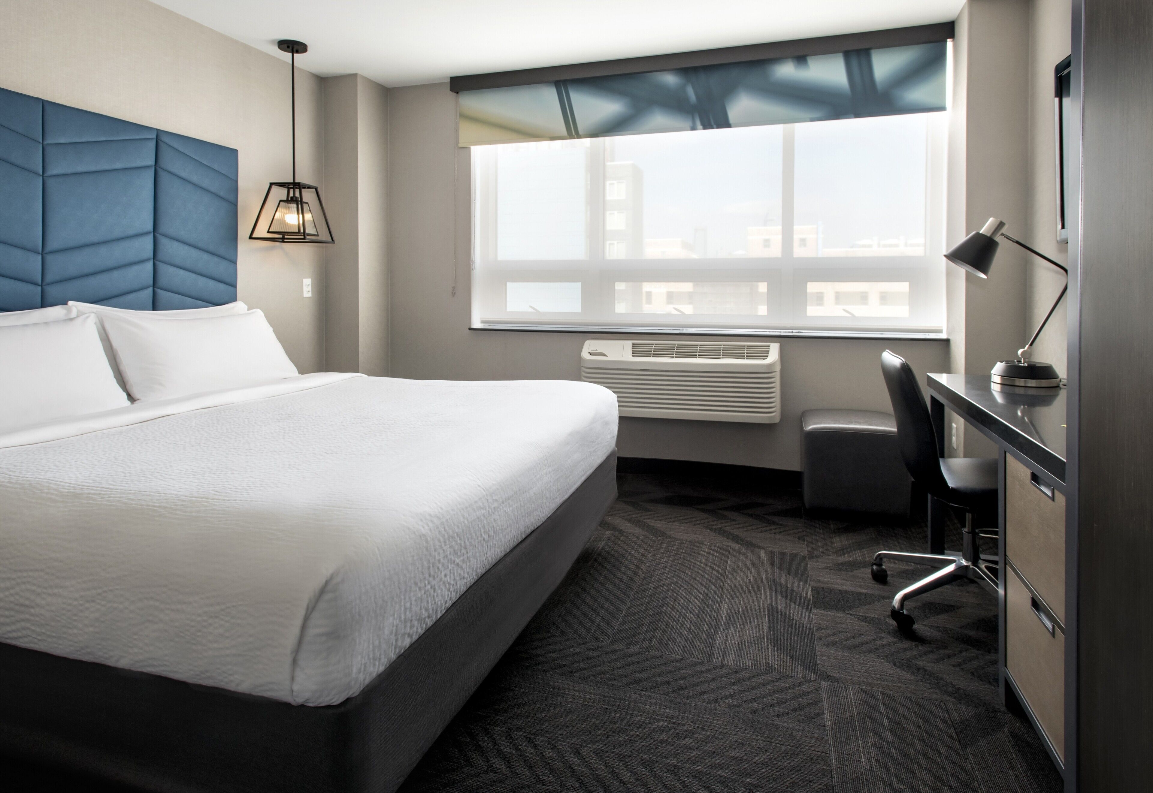 Hypo-allergenic bedding, pillow-top beds, in-room safe, desk