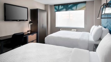 Hypo-allergenic bedding, pillowtop beds, in-room safe, desk