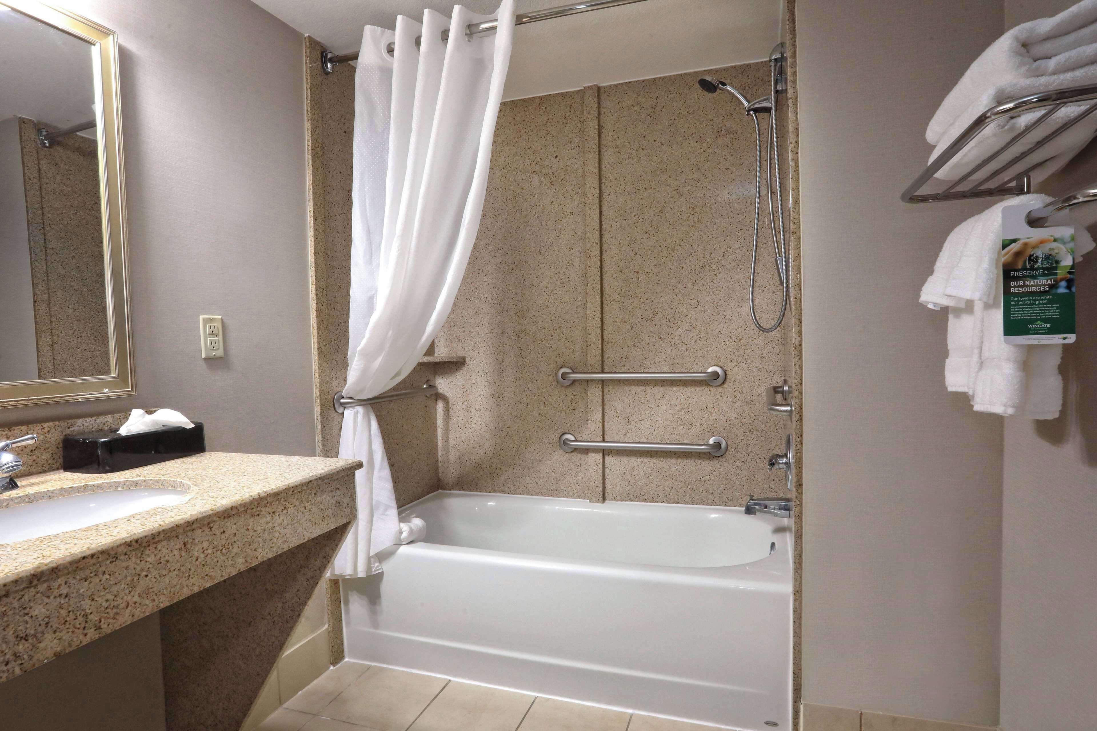 combined shower/bathtub, free toiletries, hair dryer, towels