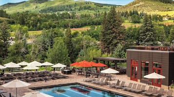 Outdoor pool, open 6:00 AM to 10:00 PM, pool loungers