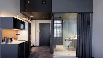 Superior Suite, King, double space | 1 bedroom, desk, laptop workspace, blackout drapes
