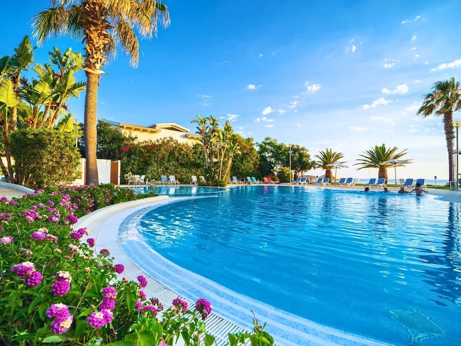 Seasonal outdoor pool, pool loungers