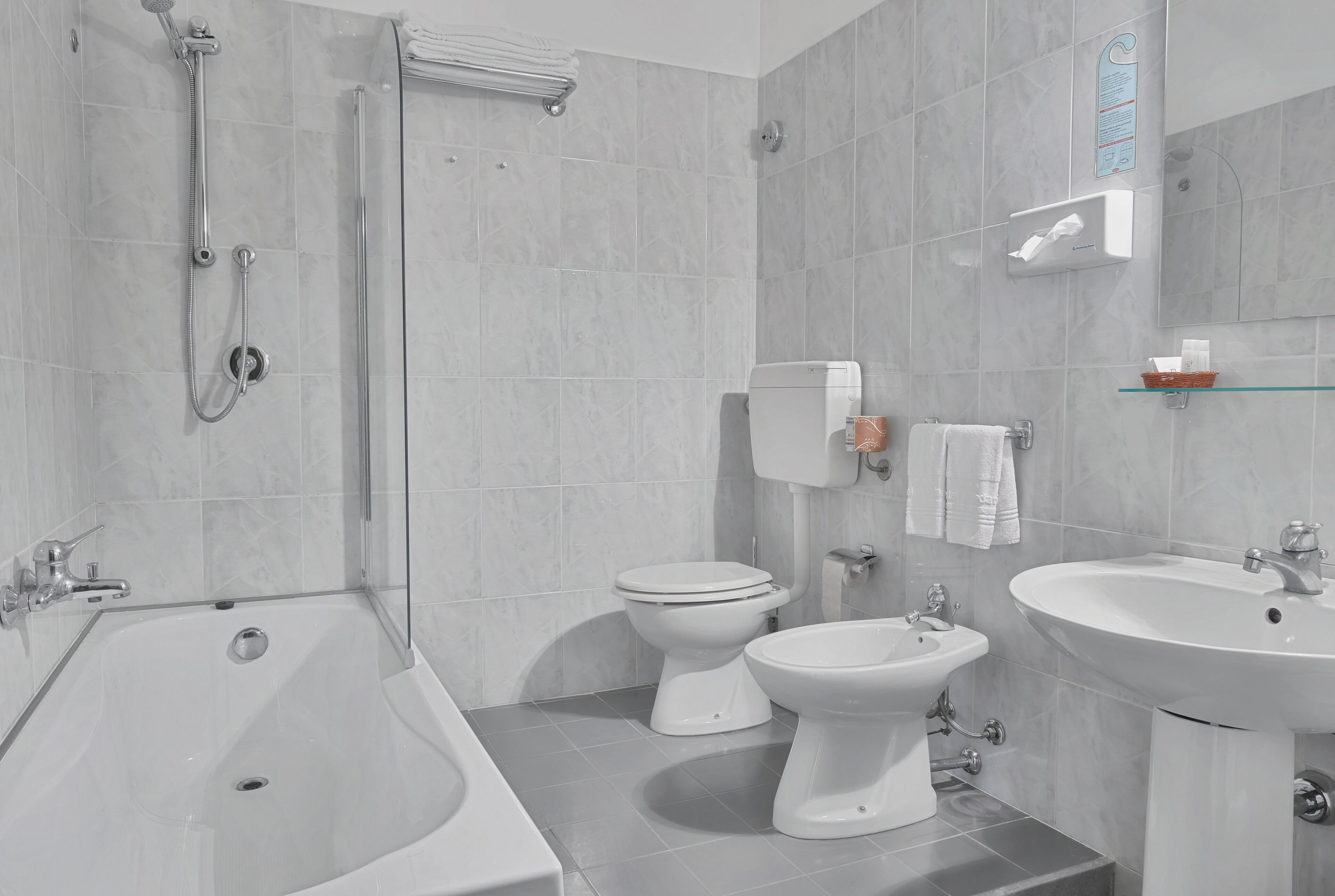 free toiletries, hair dryer, bidet, towels