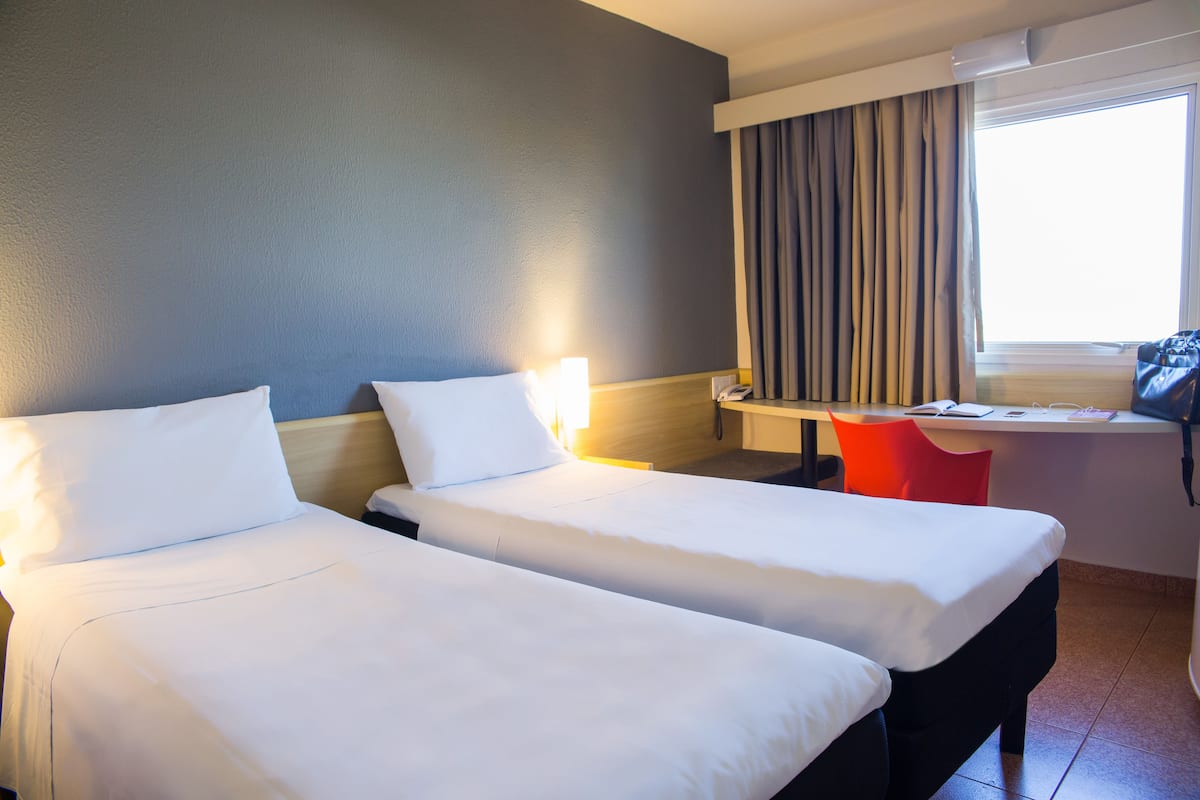 twin room, 2 single beds | premium bedding, pillow-top beds, minibar, desk