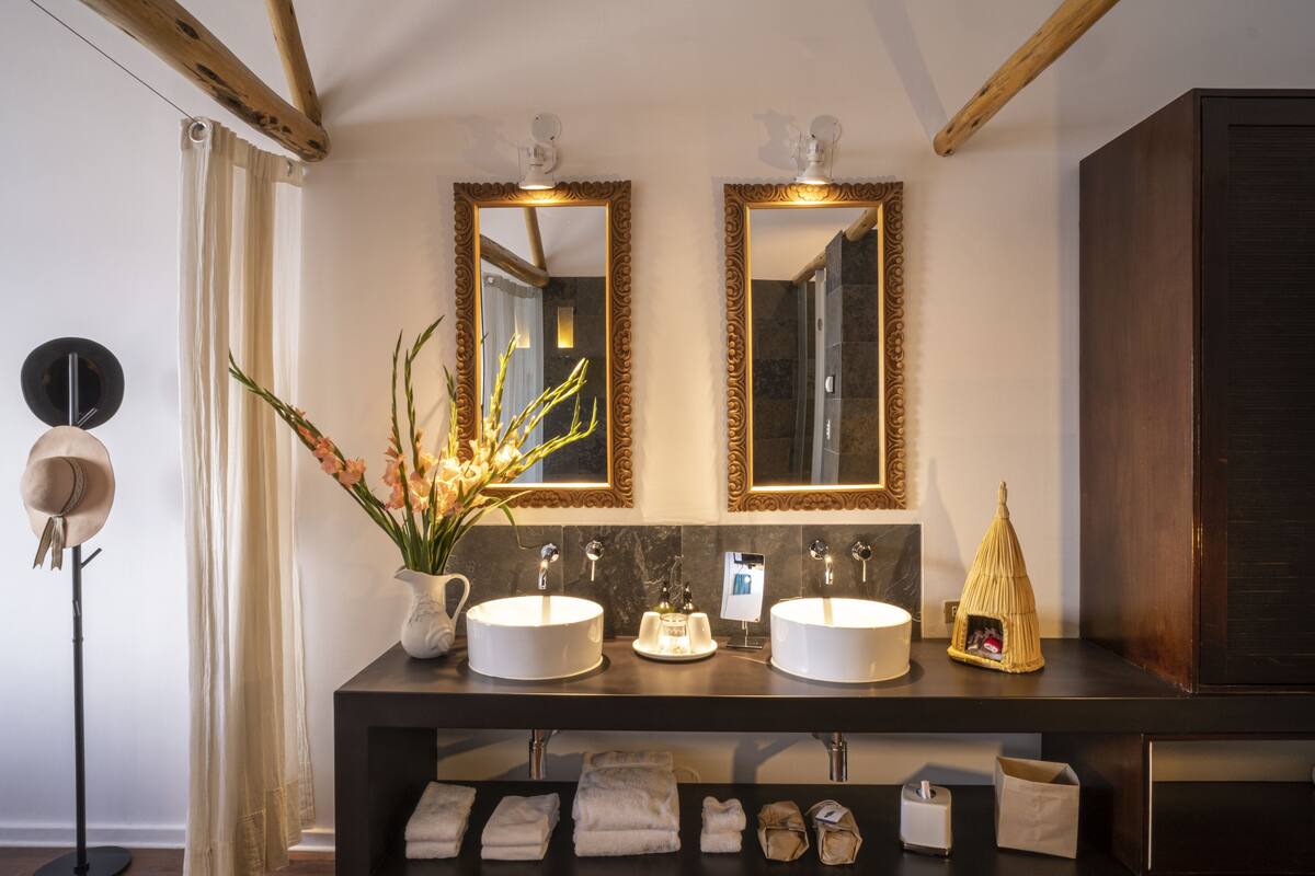 dawn room | bathroom | shower, rainfall showerhead, designer toiletries, hair dryer