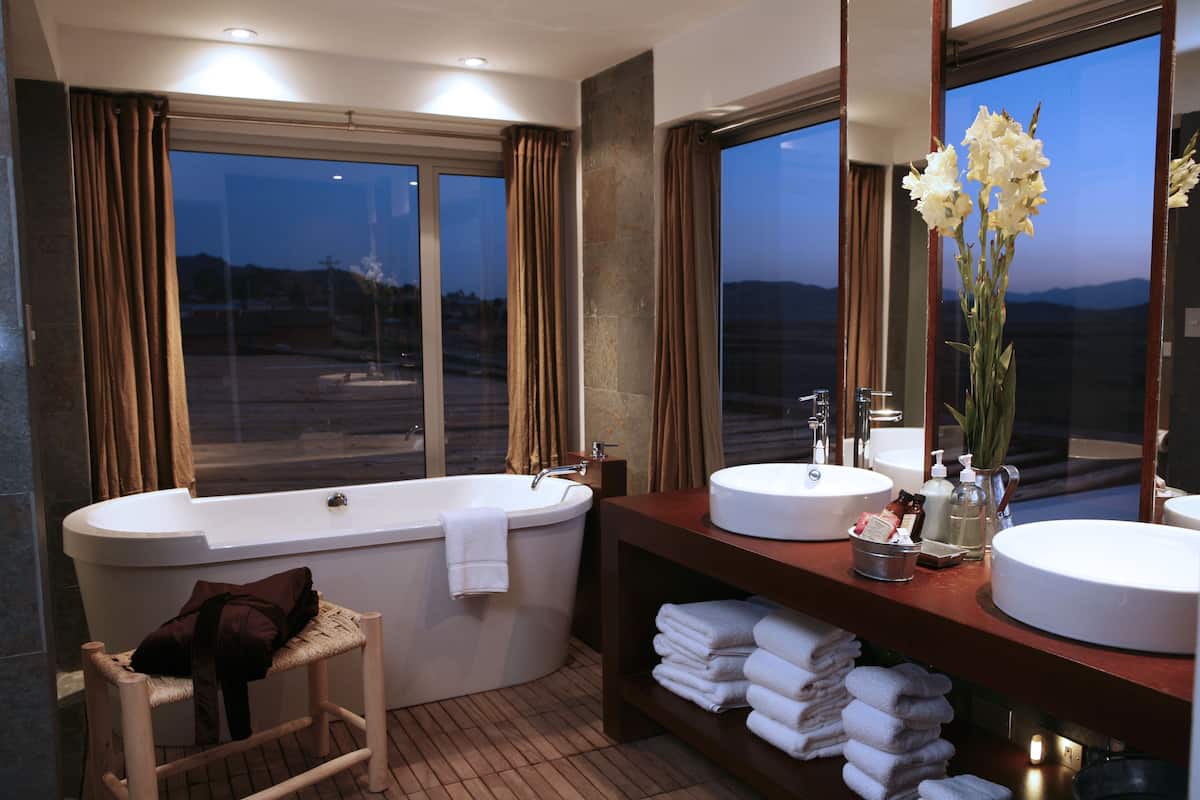 superior room | bathroom | shower, rainfall showerhead, designer toiletries, hair dryer