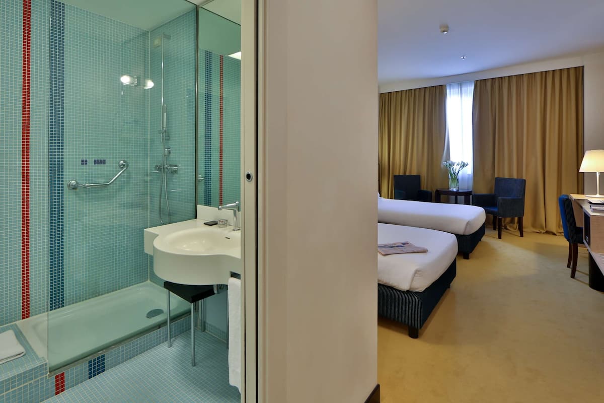 family suite, 1 king bed | bathroom | hair dryer, bidet, towels