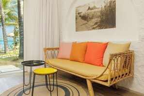 Deluxe Room (Seafront) | Minibar, in-room safe, desk, blackout drapes