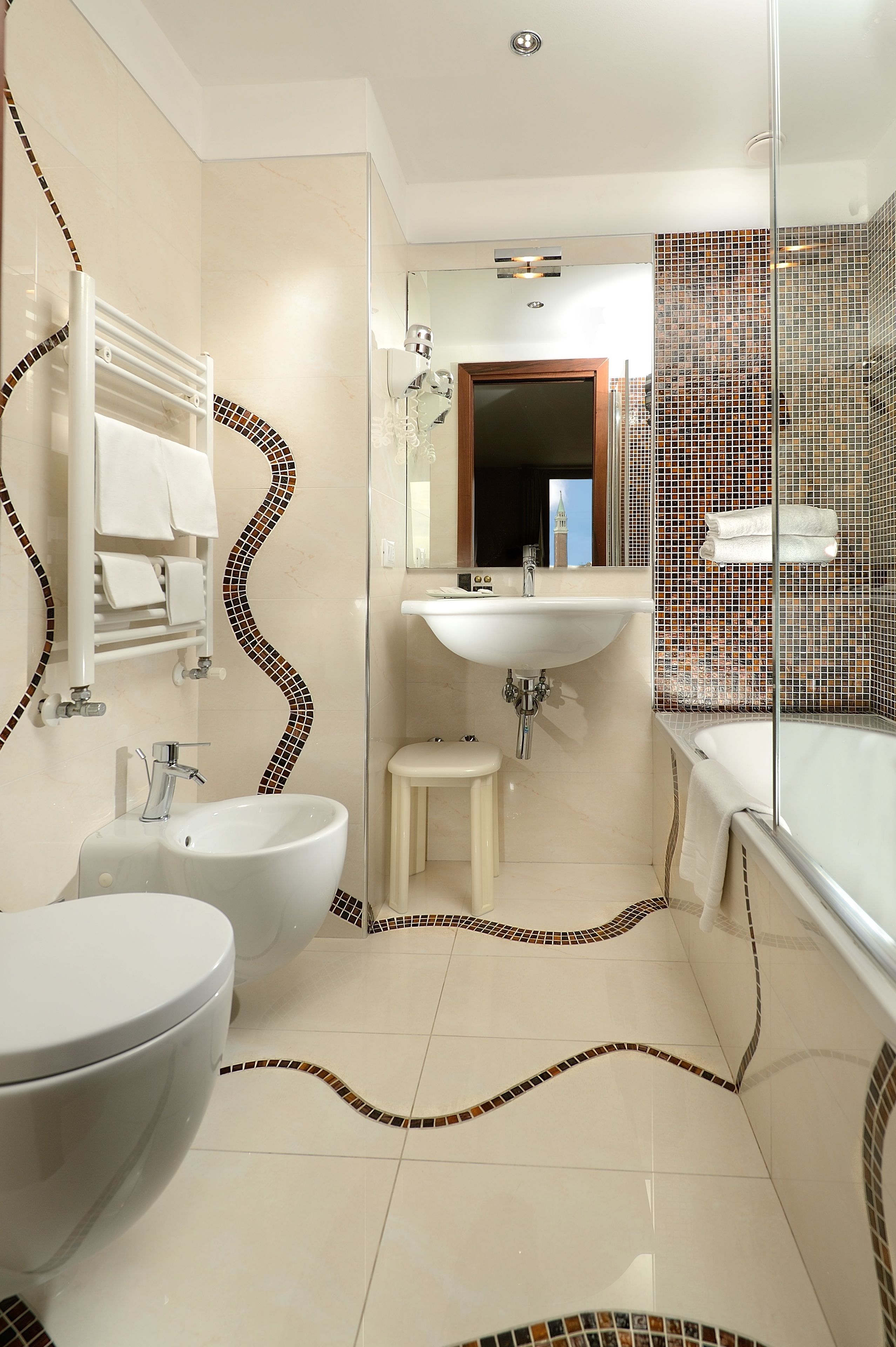 free toiletries, hair dryer, bidet, towels