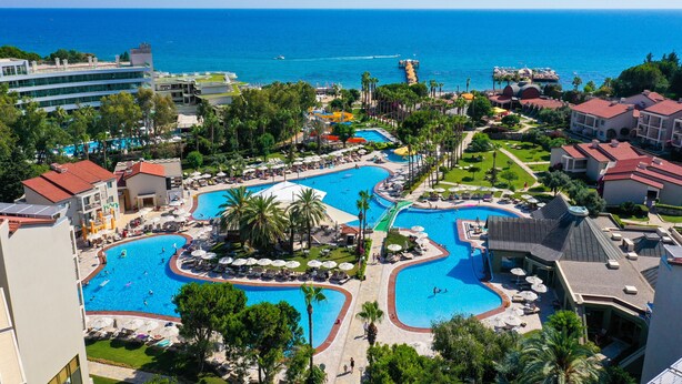 A resort with multiple swimming pools, a marina, and ocean views. - Arum Barut Collection - Ultra All Inclusive (Manavgat)