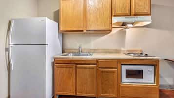 Full-sized fridge, microwave, stovetop, freezer
