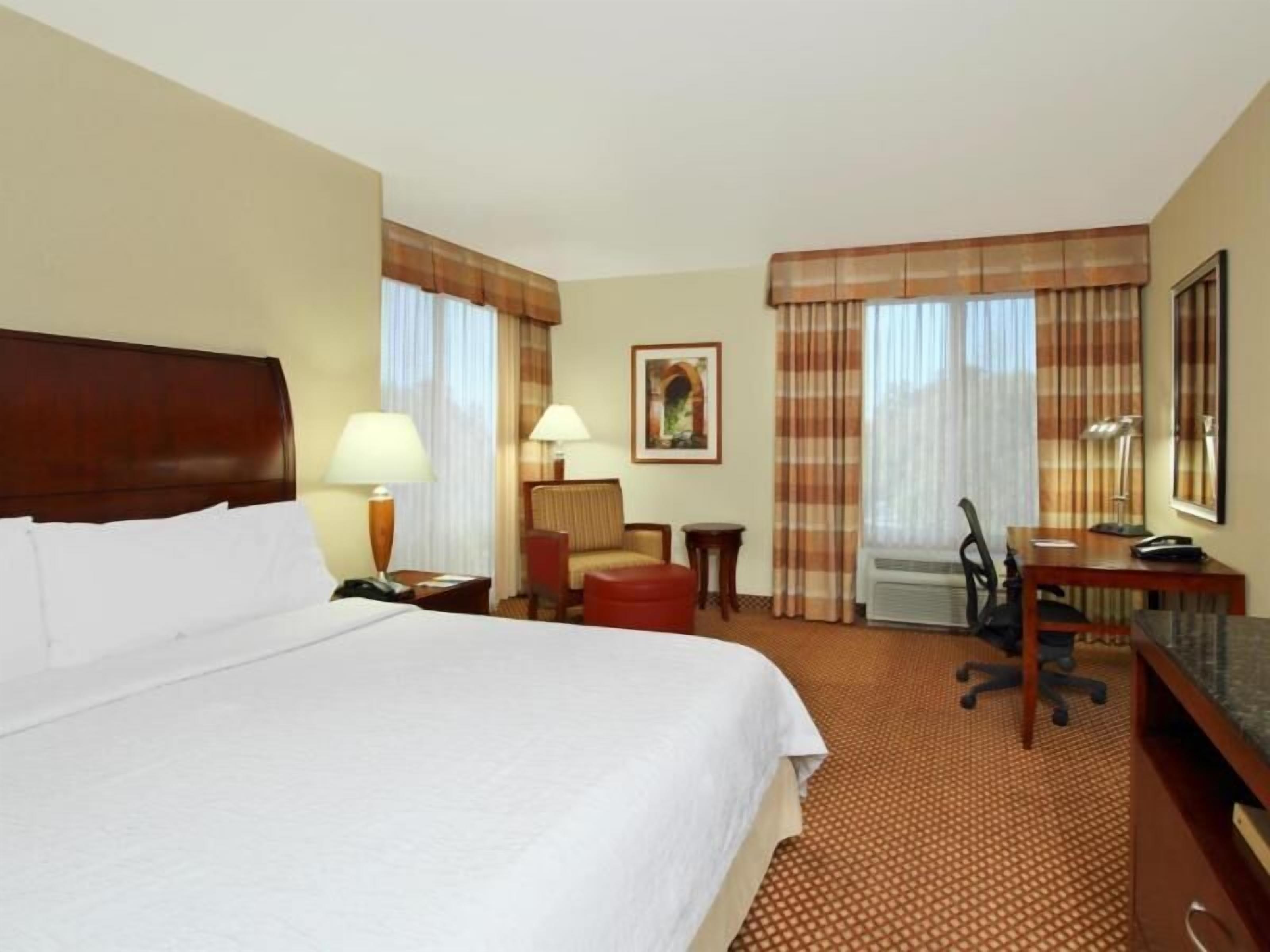 Premium bedding, down comforters, in-room safe, free cribs/infant beds