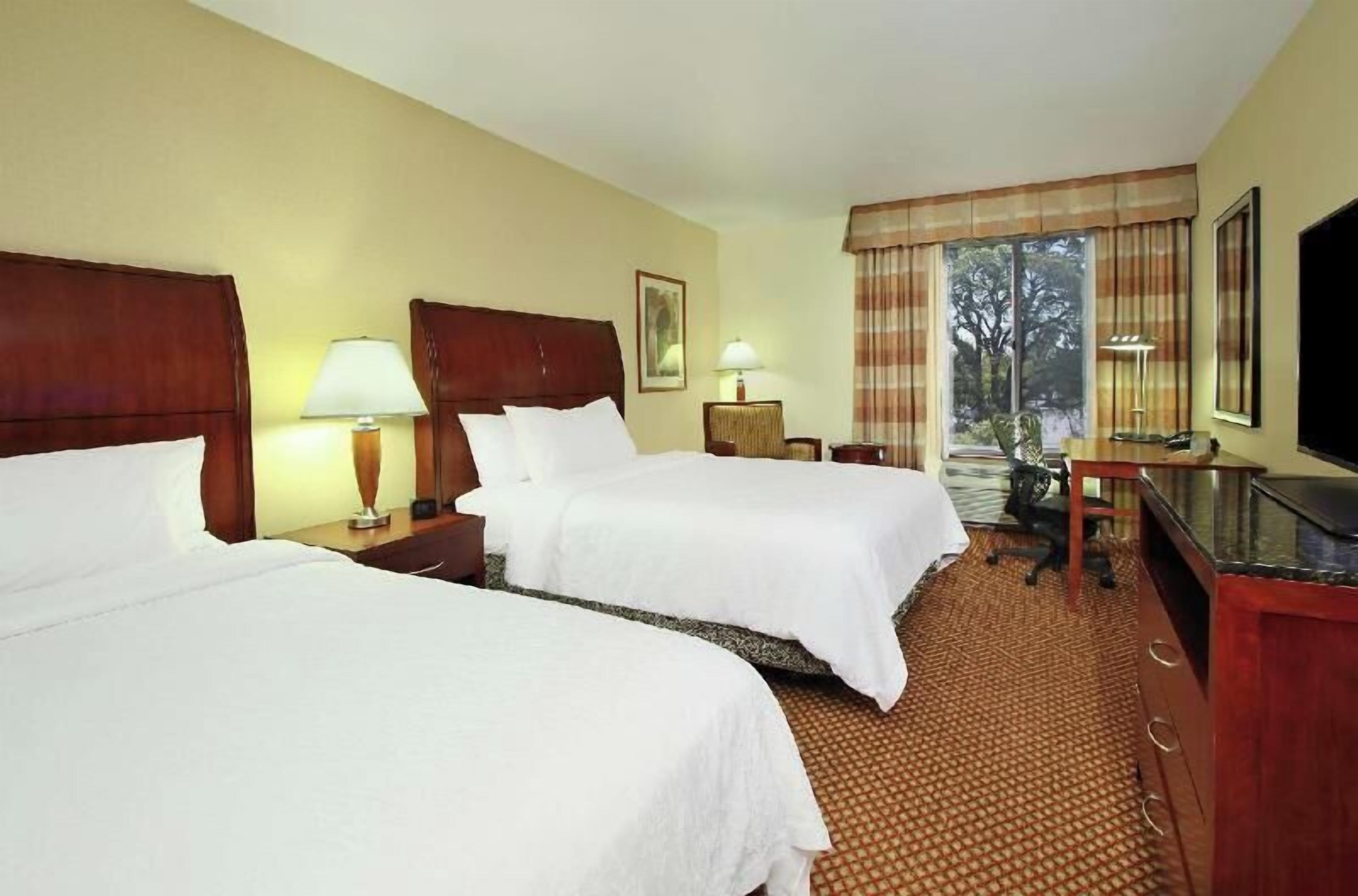 Premium bedding, down comforters, in-room safe, free cribs/infant beds