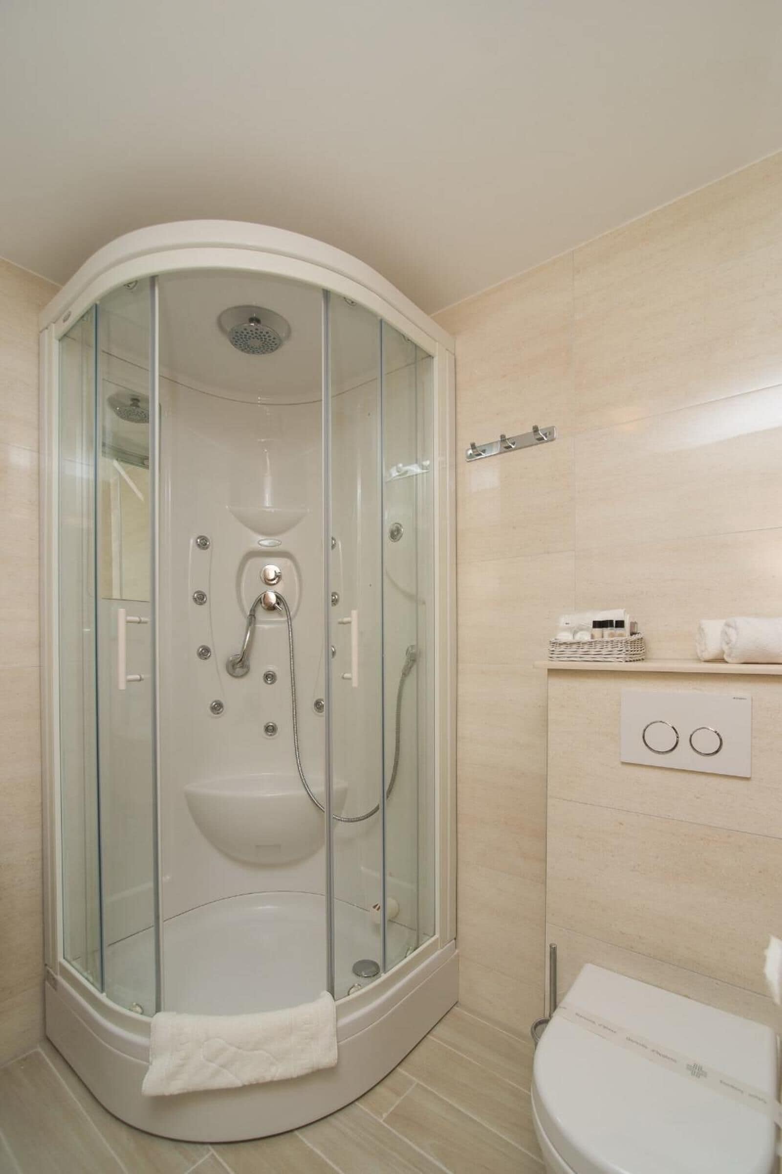 Shower, free toiletries, hair dryer, towels
