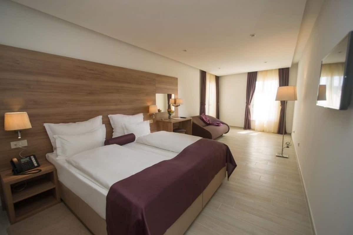 Double Room, Sea View | Living area | TV