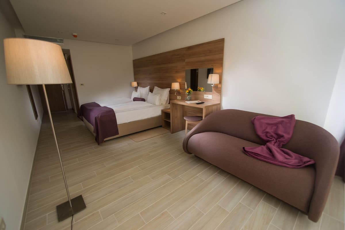 Suite, 1 Bedroom, Balcony | Premium bedding, in-room safe, iron/ironing board, cribs/infant beds