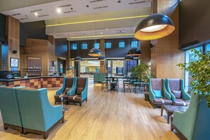 6 bars/lounges, poolside bar, beach bar