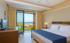 Family Room, Pool Access, Partial Sea View | 1 bedroom, free minibar, in-room safe, blackout curtains