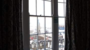 Desk, blackout curtains, iron/ironing board, bed sheets