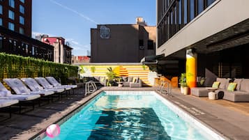 Seasonal outdoor pool, pool loungers