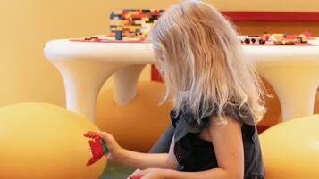 Children can play and learn on the carpeted floor.