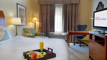 Caja fuerte, cortinas opacas, tabla de planchar con plancha