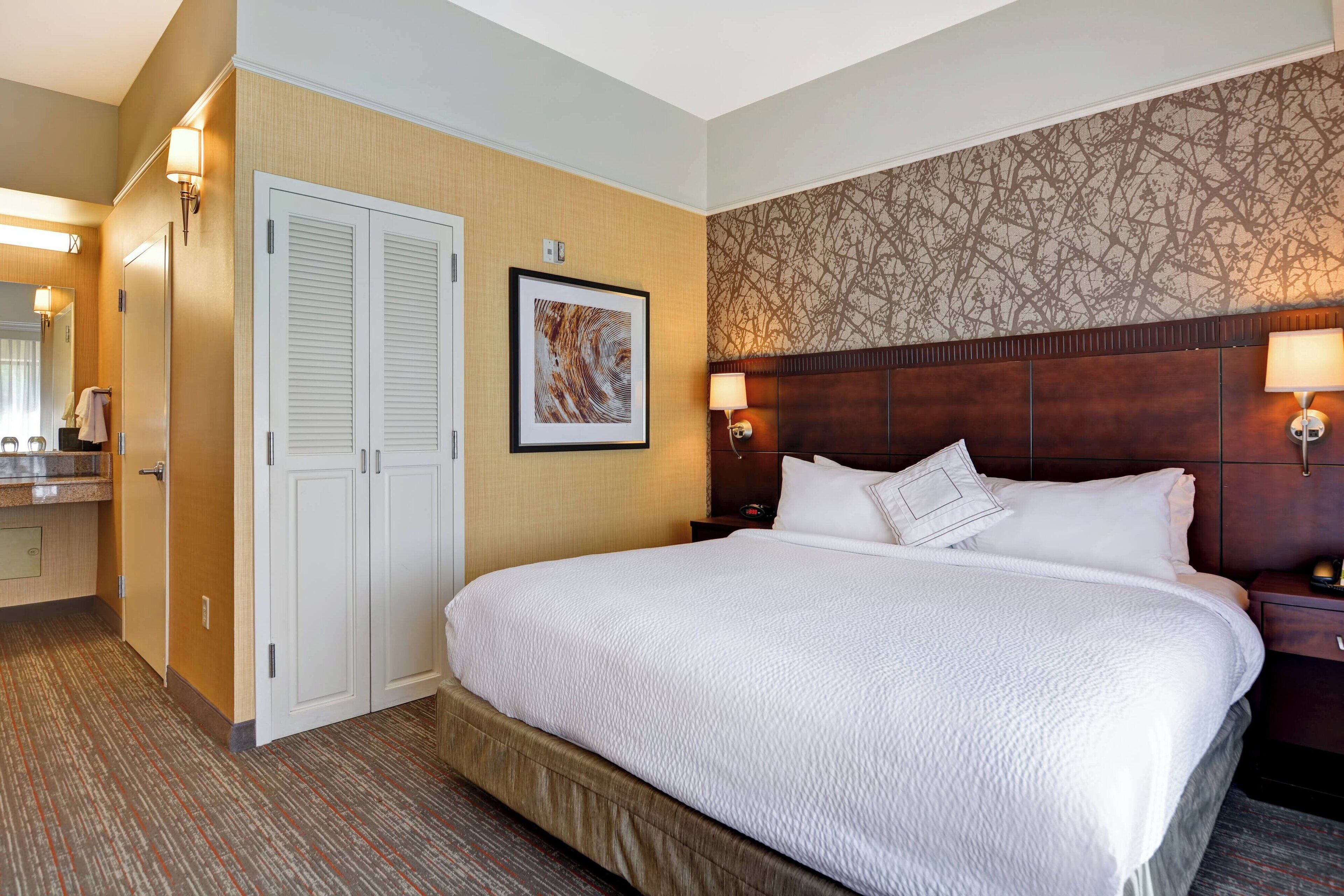 premium bedding, desk, laptop workspace, blackout curtains