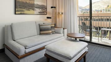 Premium bedding, desk, laptop workspace, blackout curtains