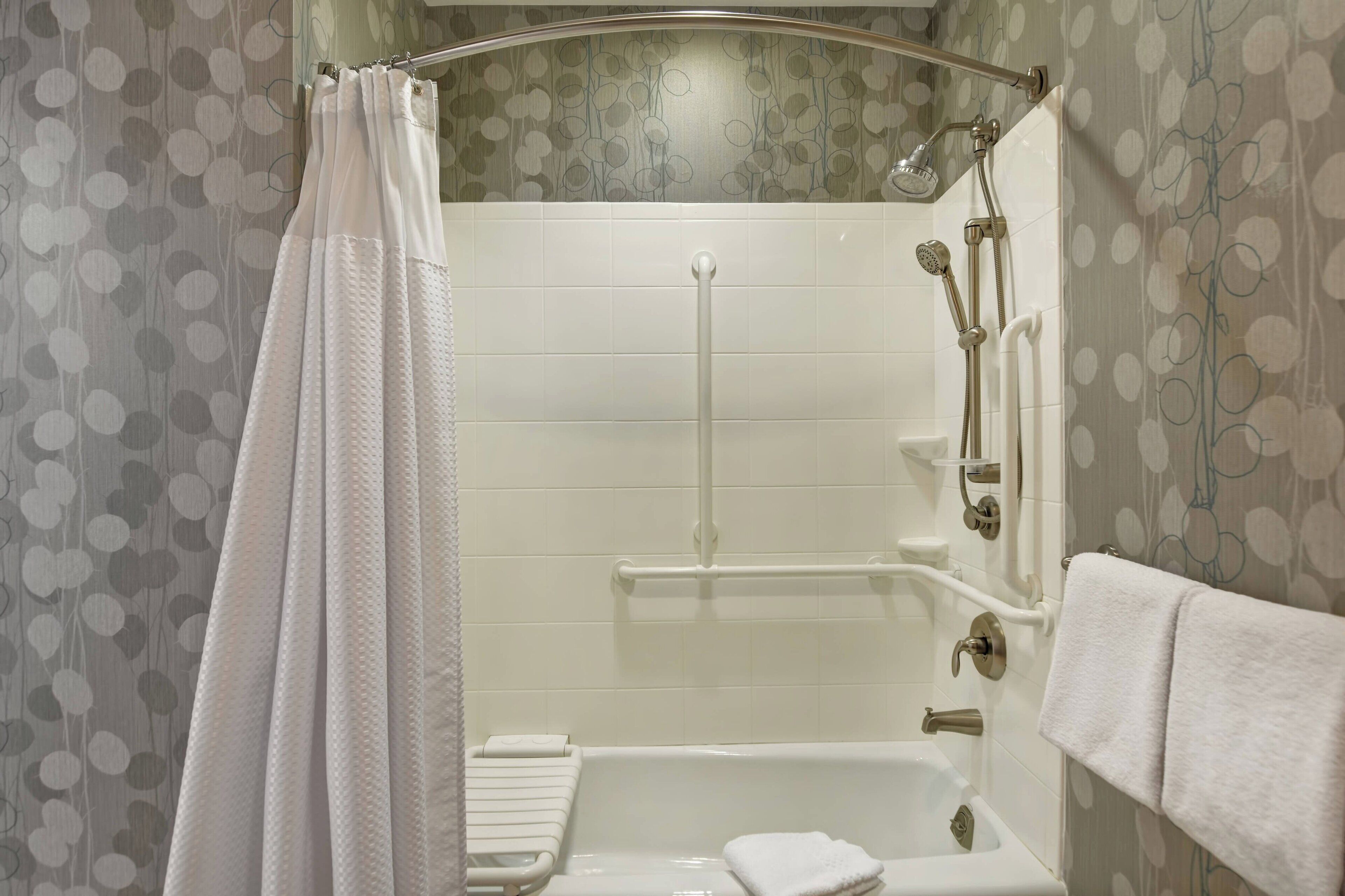 combined shower/bathtub, free toiletries, hair dryer, towels