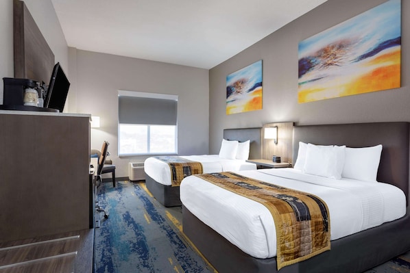 Premium bedding, desk, laptop workspace, iron/ironing board