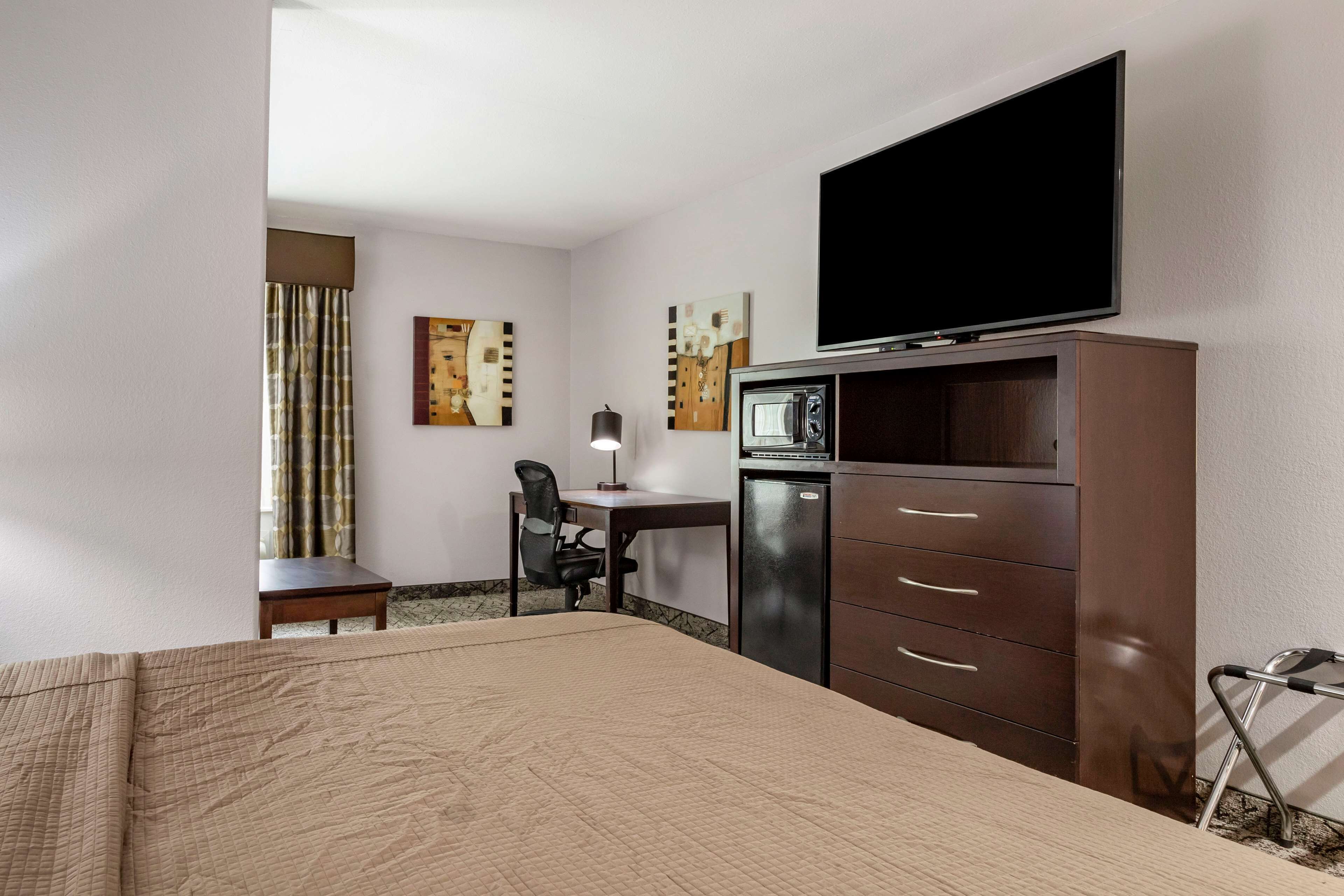 suite, 1 king bed with sofa bed, non smoking, refrigerator & microwave (with sofabed) | desk, iron/ironing board, free wifi, bed sheets