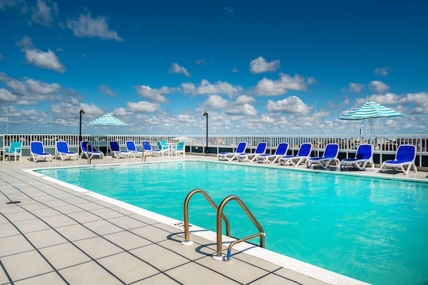 Indoor pool, seasonal outdoor pool, pool umbrellas, sun loungers