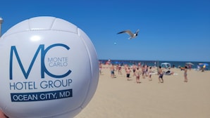 A white beach ball with "Monte Carlo Hotel Group" and "Ocean City, MD" text. - Hotel Monte Carlo Ocean City (Ocean City)