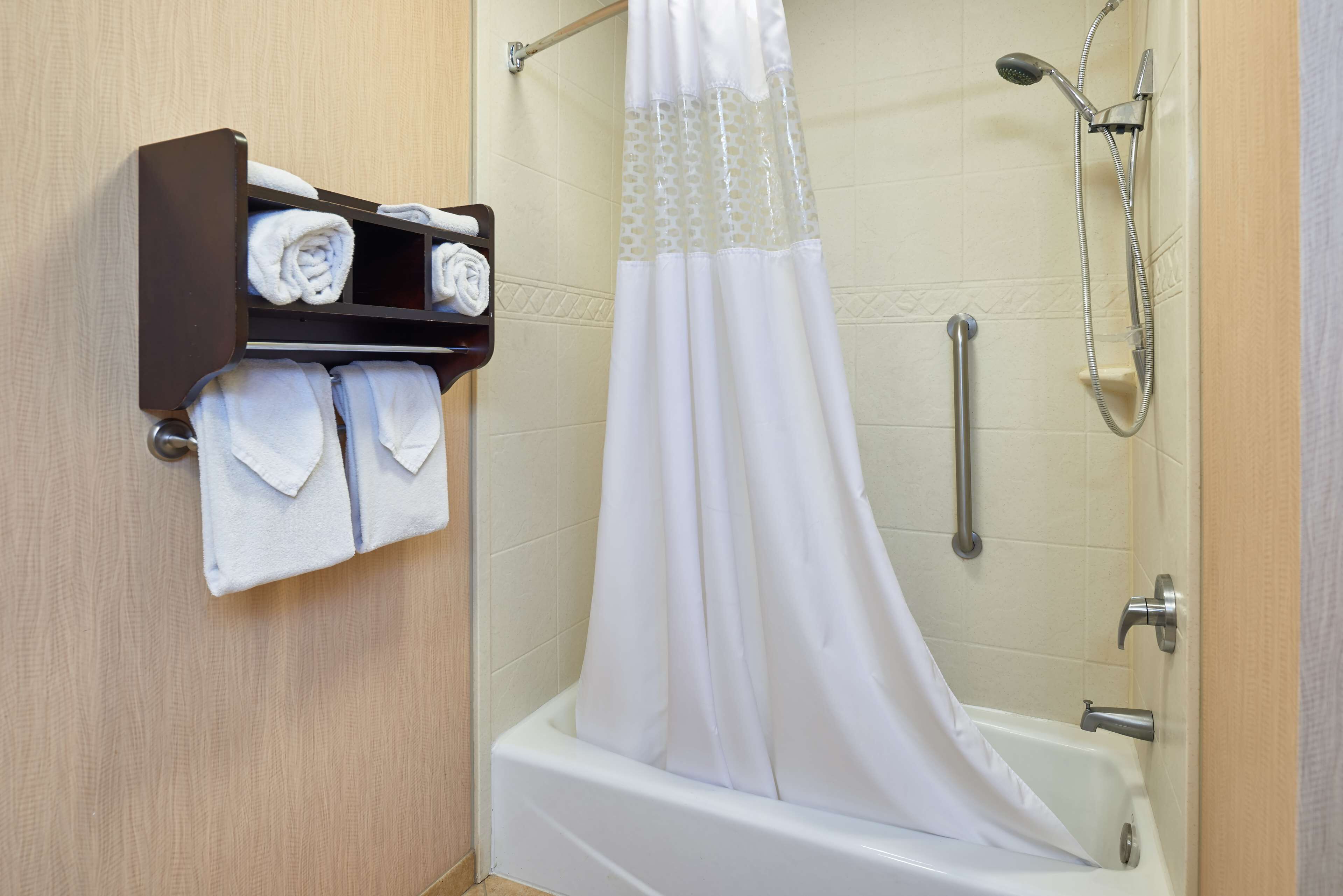 bathtub, free toiletries, hair dryer, towels