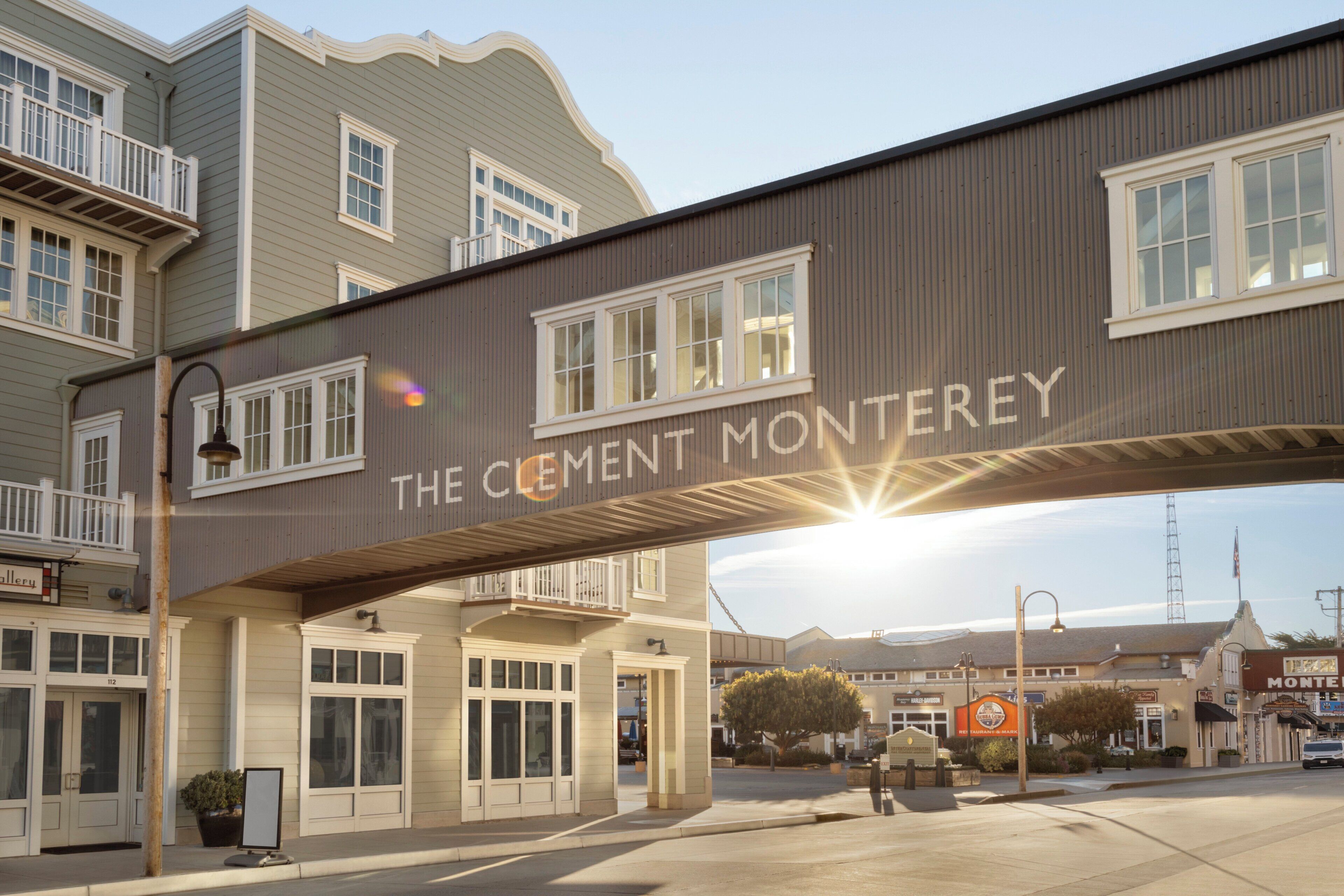 A hotel entrance with a sign reading 'The Clement Montery.'