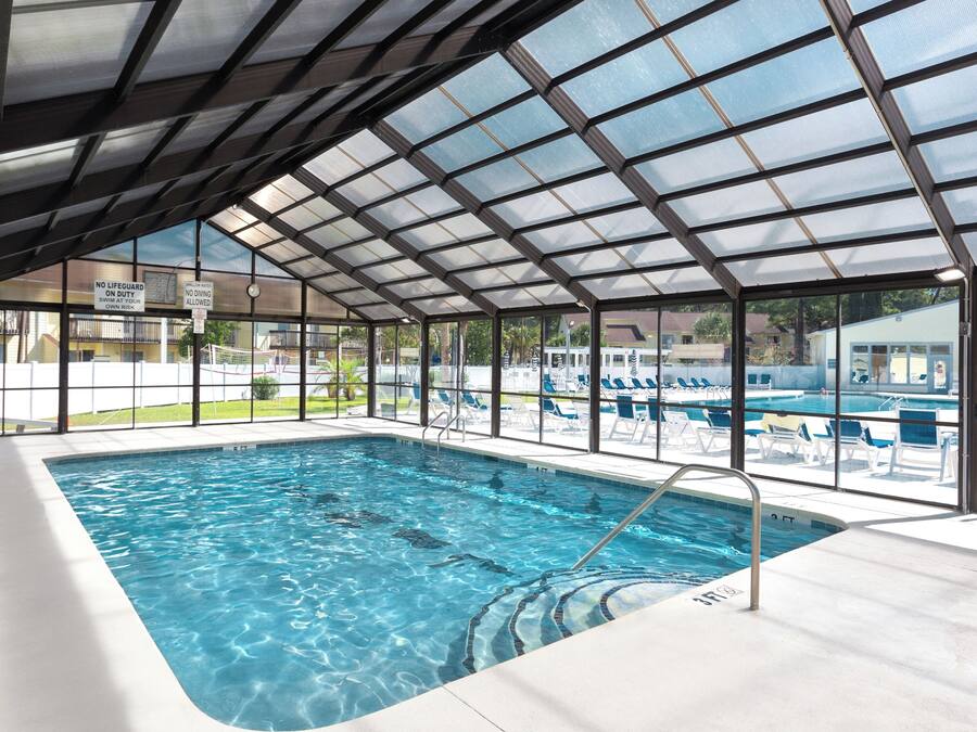 Indoor pool, outdoor pool, pool umbrellas, sun loungers