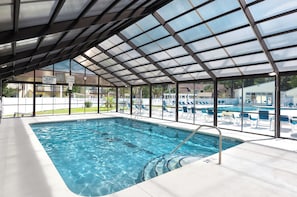 Indoor pool, outdoor pool, pool umbrellas, pool loungers
