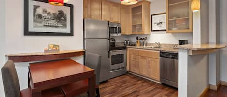 Suite, 2 Bedrooms | Private kitchen | Fridge, microwave, stovetop, dishwasher