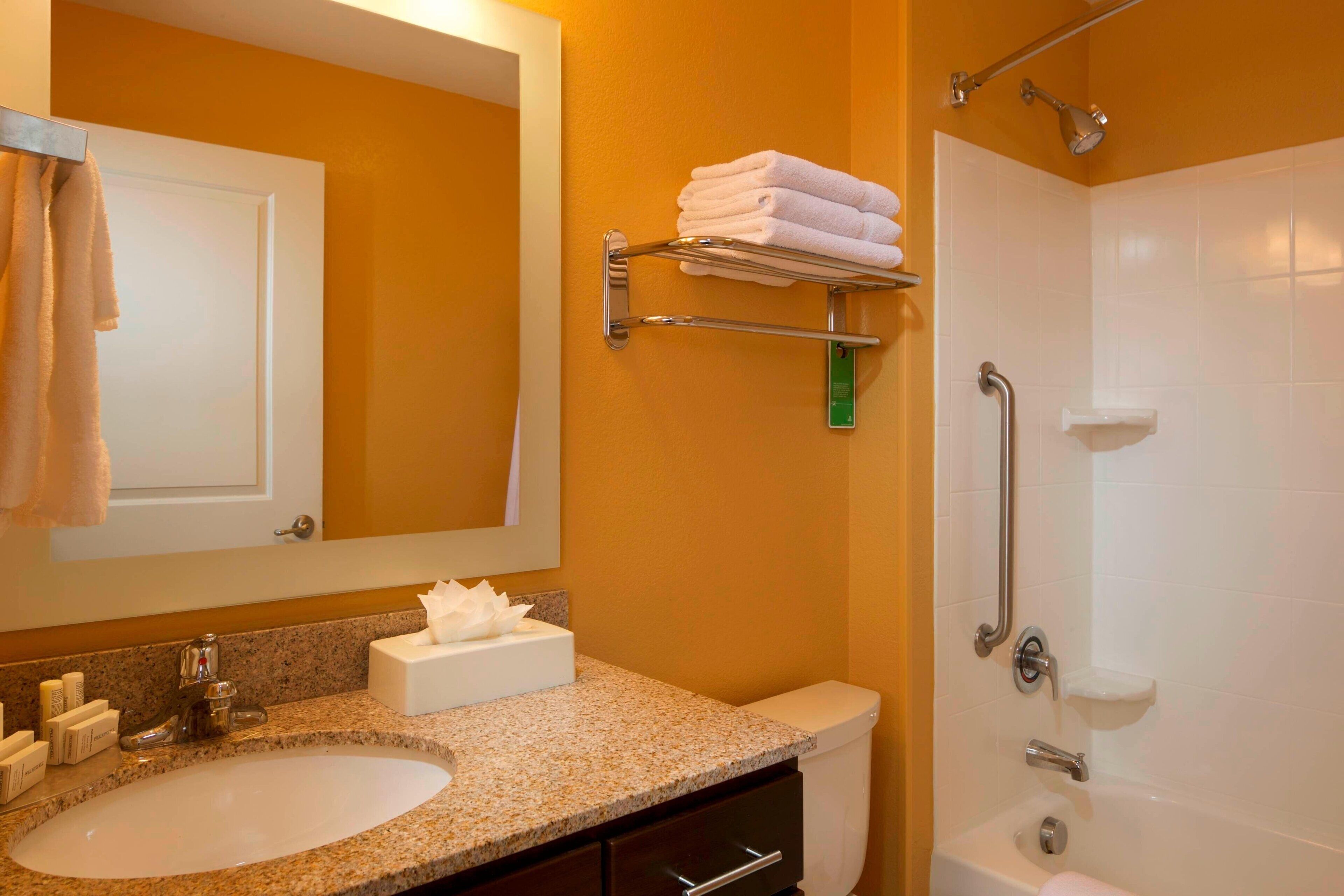 combined shower/bathtub, free toiletries, hair dryer, towels