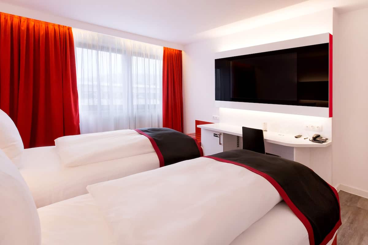 standard double or twin room | minibar, in-room safe, desk, iron/ironing board